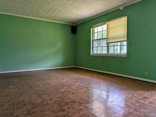 unfurnished room featuring a textured ceiling and parquet flooring