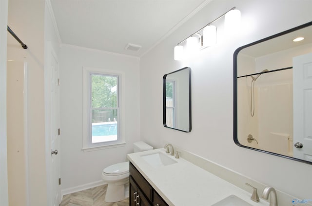 1422 Lake Crest Dr SW, Decatur, AL 35603 - bathroom featuring toilet, ornamental molding, double vanity, a shower, and baseboards