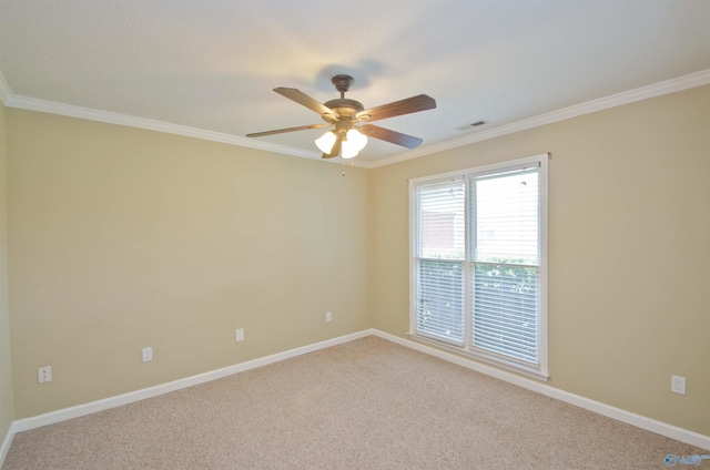 1422 Lake Crest Dr SW, Decatur, AL 35603 - empty room with carpet floors, ceiling fan, crown molding, and baseboards