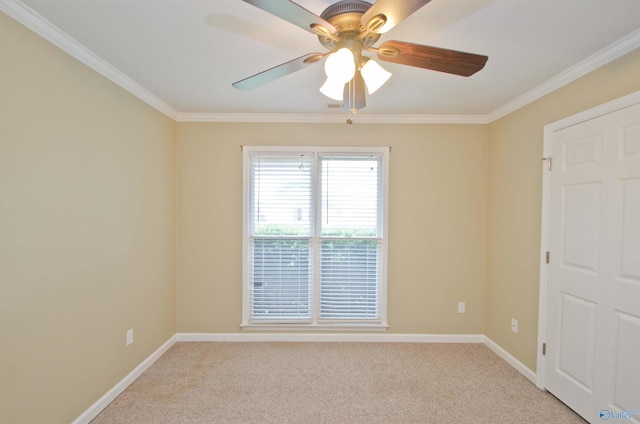 1422 Lake Crest Dr SW, Decatur, AL 35603 - empty room with crown molding, ceiling fan, light colored carpet, and baseboards