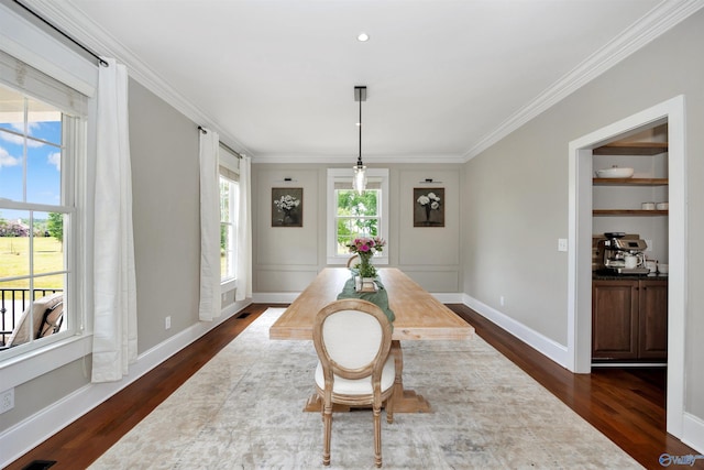 1211 SW Rountree Pl, Madison, AL 35756 - dining space with dark wood finished floors, crown molding, and baseboards