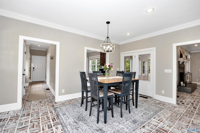 1211 SW Rountree Pl, Madison, AL 35756 - dining room featuring brick floors, baseboards, a chandelier, crown molding, and recessed lighting