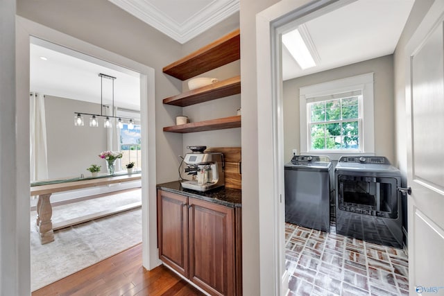 1211 SW Rountree Pl, Madison, AL 35756 - laundry room featuring washing machine and clothes dryer and crown molding