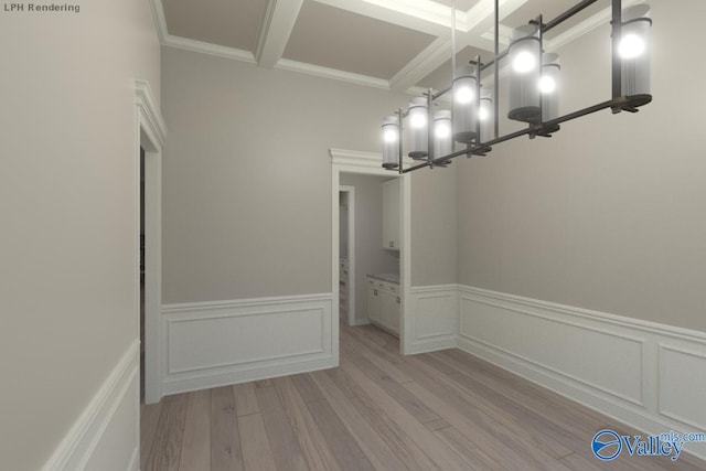 unfurnished dining area featuring beamed ceiling, light hardwood / wood-style floors, ornamental molding, and a notable chandelier