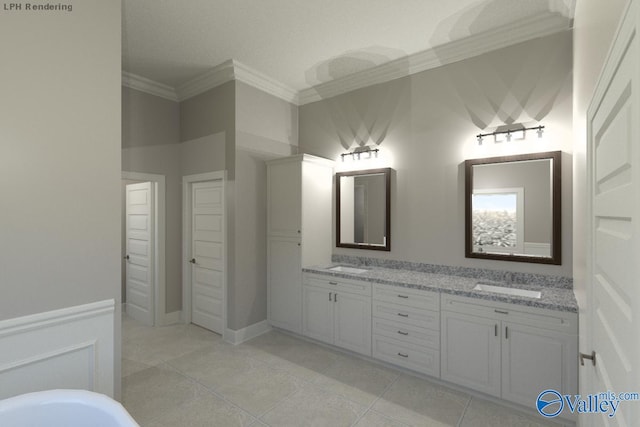 bathroom featuring tile patterned floors, crown molding, and vanity