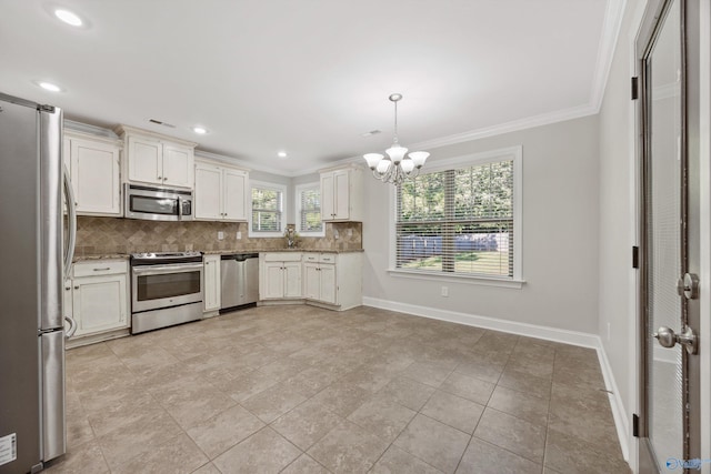 119 Saint Clair Ln, Huntsville, AL 35811 - kitchen featuring stainless steel appliances, a chandelier, decorative backsplash, ornamental molding, and baseboards