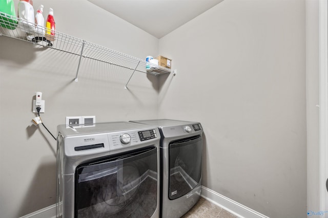 119 Saint Clair Ln, Huntsville, AL 35811 - laundry room with baseboards, separate washer and dryer, and light tile patterned floors