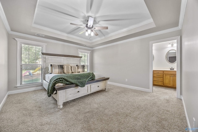 119 Saint Clair Ln, Huntsville, AL 35811 - bedroom featuring a raised ceiling, light carpet, baseboards, crown molding, and ensuite bathroom