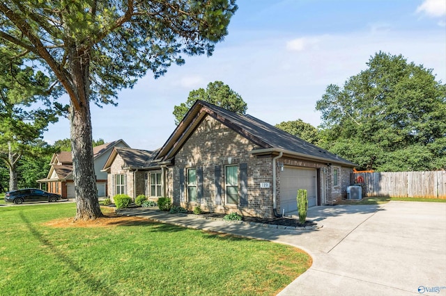 119 Saint Clair Ln, Huntsville, AL 35811 - view of front of home featuring driveway, a garage, brick siding, and central air condition unit