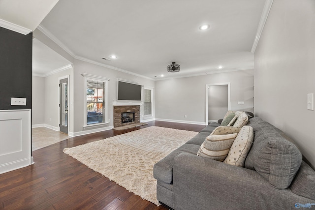119 Saint Clair Ln, Huntsville, AL 35811 - living room with hardwood / wood-style flooring, recessed lighting, crown molding, baseboards, and a stone fireplace