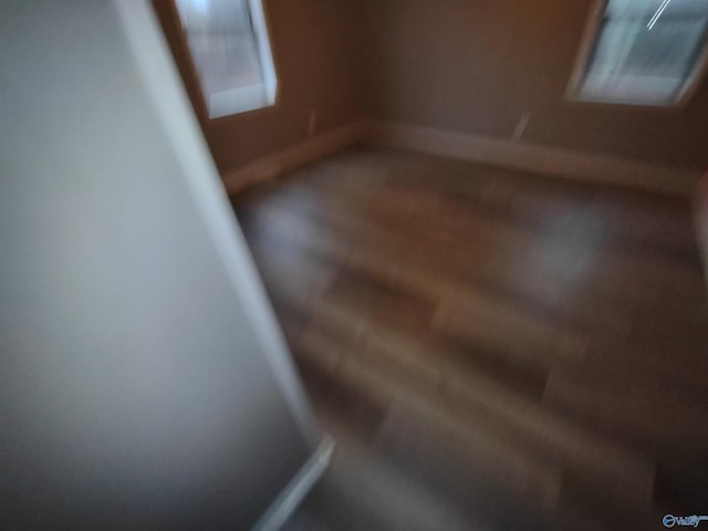 empty room with baseboards