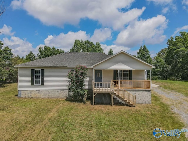 view of front of home with a porch, stairway, a shingled roof, crawl space, and a front lawn