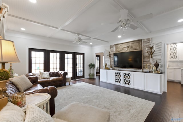 living room with coffered ceiling, dark wood-type flooring, ceiling fan, and french doors