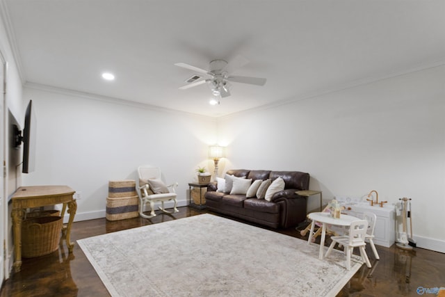 living room featuring crown molding and ceiling fan