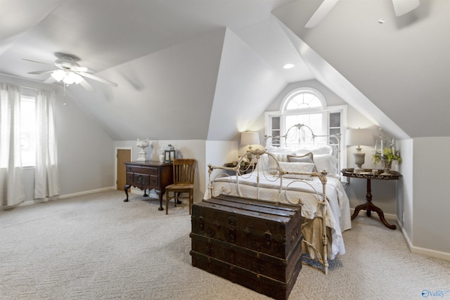 carpeted bedroom with lofted ceiling and ceiling fan