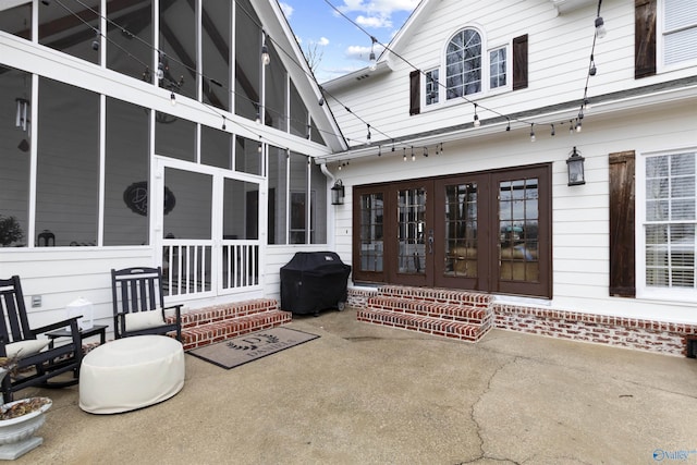 view of patio featuring a grill and french doors