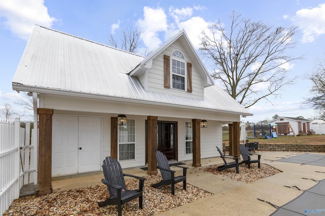 view of front facade featuring a garage and covered porch