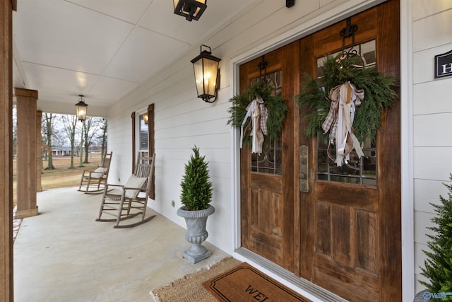 doorway to property with a porch