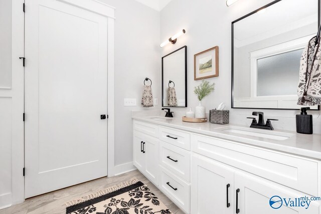 bathroom featuring double sink vanity