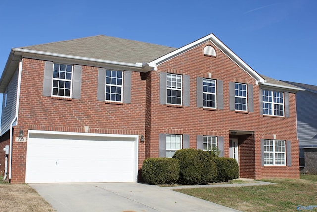 colonial home featuring a garage