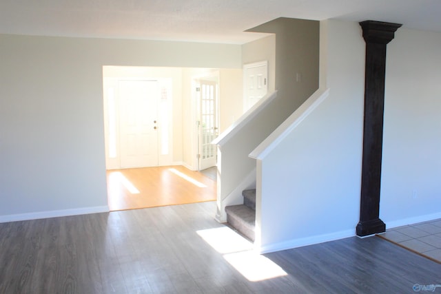 staircase featuring hardwood / wood-style floors