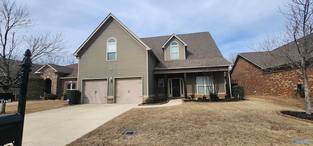 traditional home featuring concrete driveway, a garage, and roof with shingles