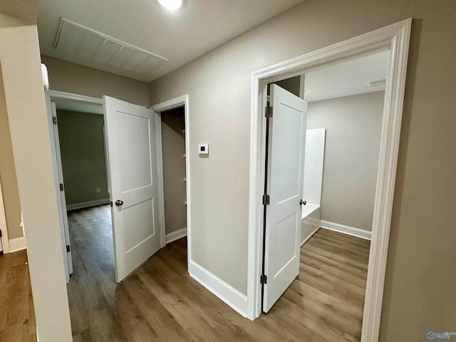 hall featuring light hardwood / wood-style floors