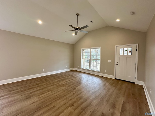 entrance foyer with dark hardwood / wood-style floors, vaulted ceiling, and ceiling fan