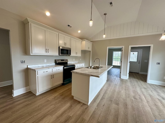 kitchen featuring white cabinetry, sink, electric stove, and hanging light fixtures