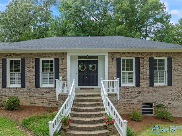 ranch-style home featuring a porch