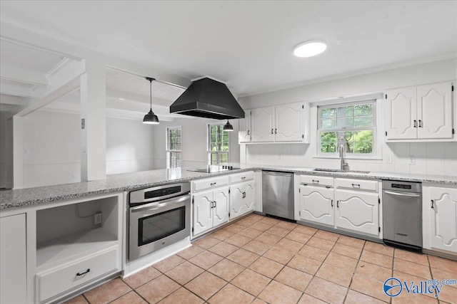 kitchen with light tile patterned flooring, stainless steel appliances, and white cabinetry