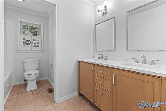 bathroom featuring toilet, tile patterned floors, double sink vanity, and crown molding