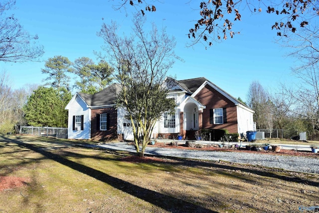 view of front of house with a front lawn