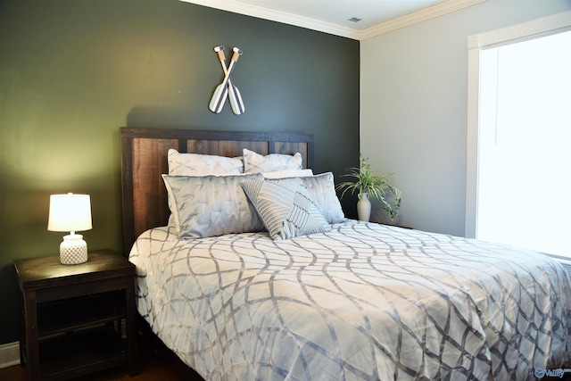 bedroom featuring ornamental molding