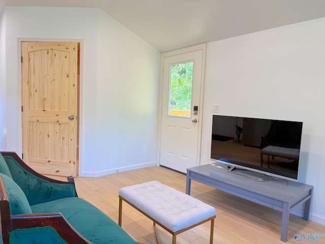 140 Ben Johnson Rd, Pulaski, TN 38478 - sitting room with light wood-style floors, vaulted ceiling, and baseboards