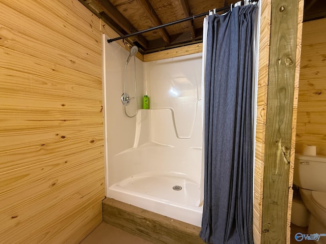 140 Ben Johnson Rd, Pulaski, TN 38478 - bathroom featuring toilet, a shower, and wood walls