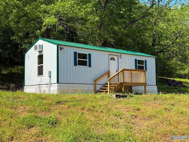 140 Ben Johnson Rd, Pulaski, TN 38478 - manufactured / mobile home with metal roof and a wall mounted air conditioner
