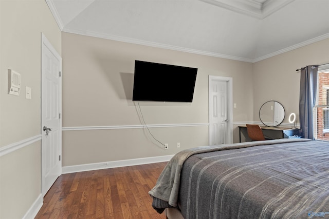 bedroom with lofted ceiling, wood-type flooring, baseboards, and crown molding