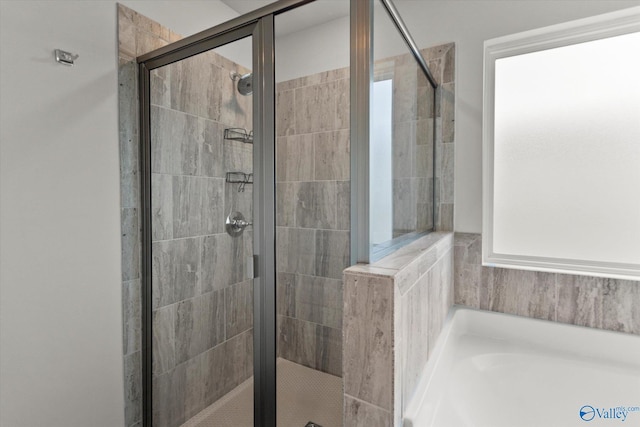 4226 Textile Ln SW, Huntsville, AL 35805 - bathroom with a bath and a stall shower