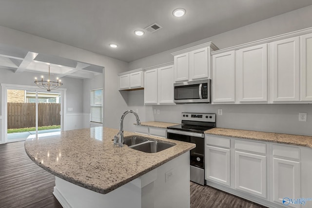 4226 Textile Ln SW, Huntsville, AL 35805 - kitchen featuring stainless steel appliances, a sink, dark wood-type flooring, white cabinets, and recessed lighting