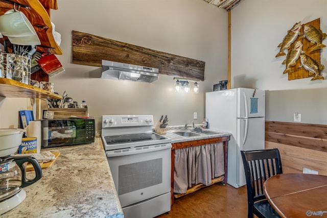 kitchen with white appliances, concrete floors, ventilation hood, and a sink