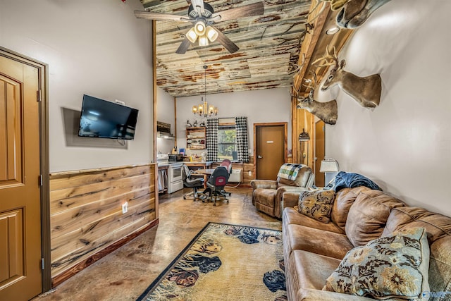 living room featuring finished concrete flooring, high vaulted ceiling, ceiling fan with notable chandelier, and wooden ceiling