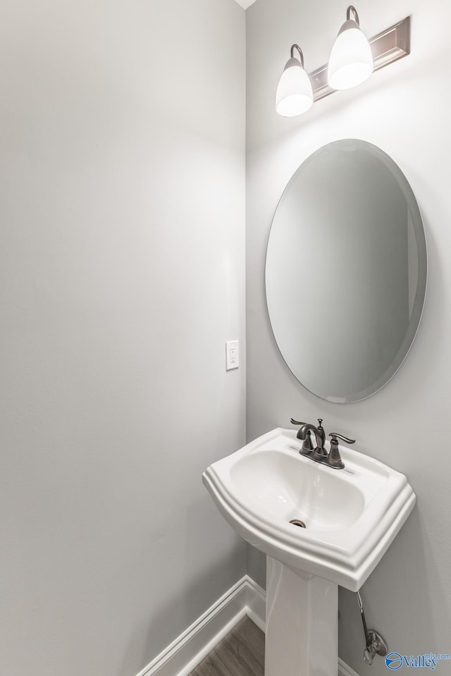 bathroom featuring hardwood / wood-style flooring