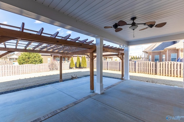 view of patio / terrace with ceiling fan and a pergola