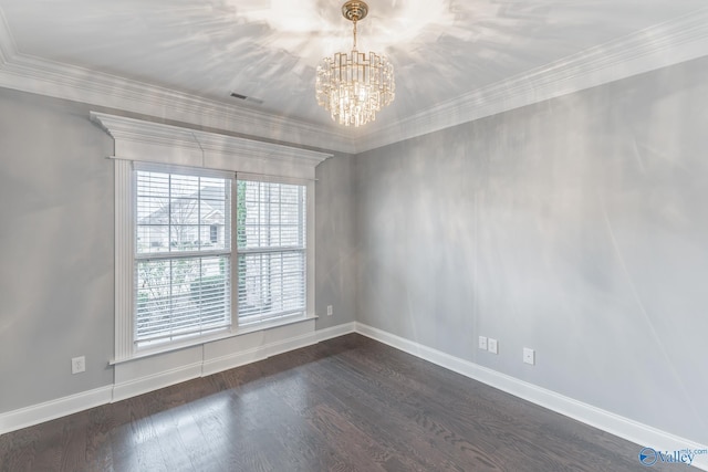 unfurnished room featuring a chandelier, ornamental molding, and dark wood-type flooring