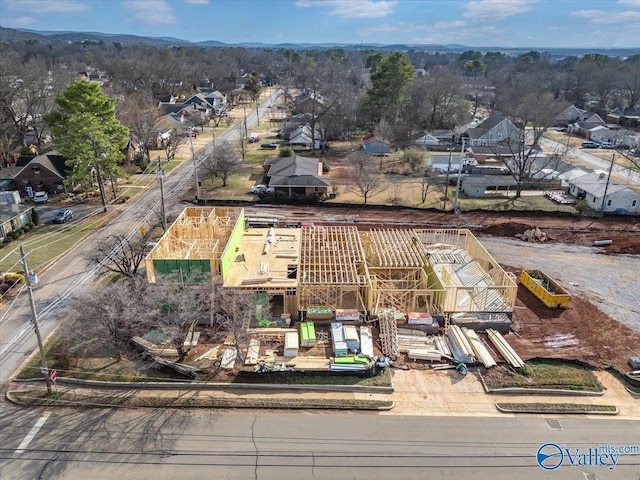 birds eye view of property with a residential view