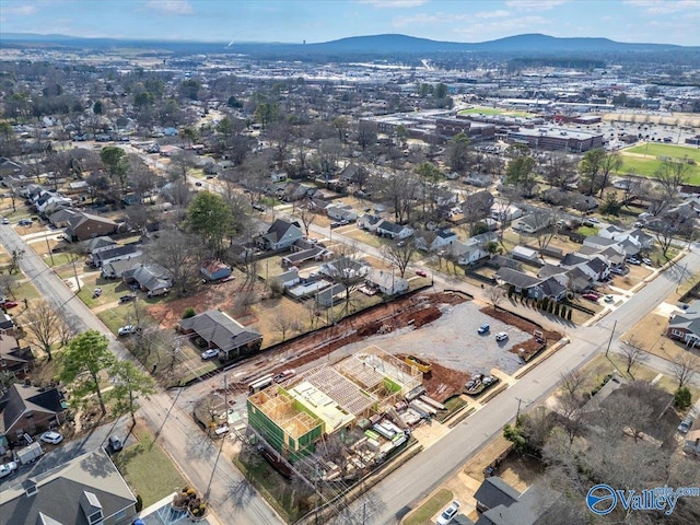 drone / aerial view with a residential view and a mountain view