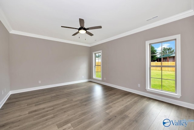 210 Lyndon Cove Rd, Huntsville, AL 35811 - empty room featuring wood finished floors, a ceiling fan, and crown molding