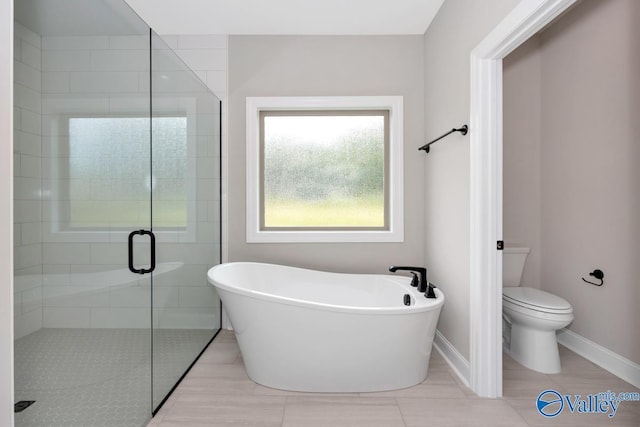 210 Lyndon Cove Rd, Huntsville, AL 35811 - full bathroom featuring a freestanding bath and a stall shower