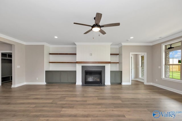 210 Lyndon Cove Rd, Huntsville, AL 35811 - unfurnished living room with a ceiling fan, ornamental molding, a fireplace, dark wood-style floors, and recessed lighting